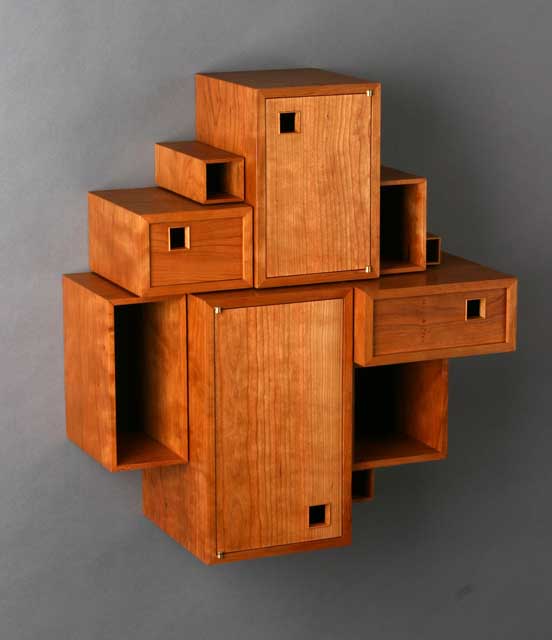 Clark Kellogg|10 Small Boxes Huddled Together for Warmth. Cherry.